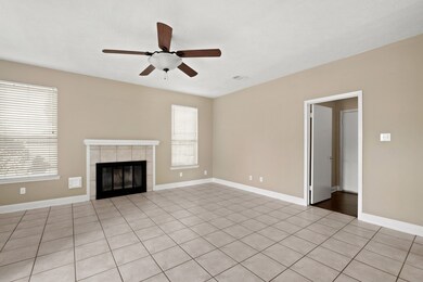 Large family room with extensive tile flooring ~