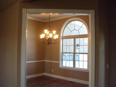 Lots of details!  Crown and chair rail molding. Fluted casing with rosette details at corners, and window trim.  10Ft Ceilings and large Picture Window! Very Light & Bright! Pictures for representation purposes only!