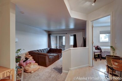 Hallway view to living & bedroom 2