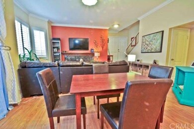 Dining area looking into living area and front ent