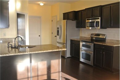 ...AND ANOTHER VIEW OF THE KITCHEN...