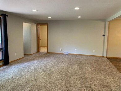 Princeton St / deck entrance.  Bedroom 3 in foregr