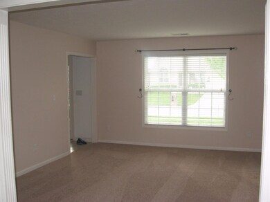 Formal living room with new carpet and f
