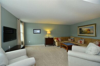 The family room features lots of natural light and