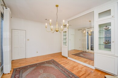 Dining room area with windows creating natural light and beautiful scenery.