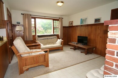 Family Room is Light and Bright with Carpet