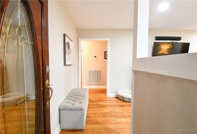 Foyer featuring hardwood flooring