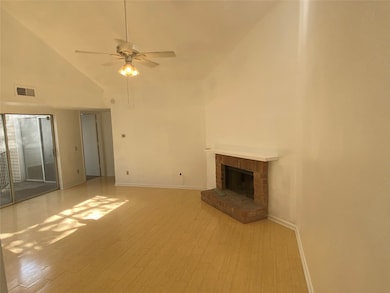 View of unit from front door. Wood burning firepla