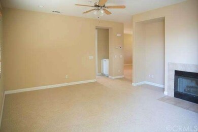 The Living Room with Fireplace.