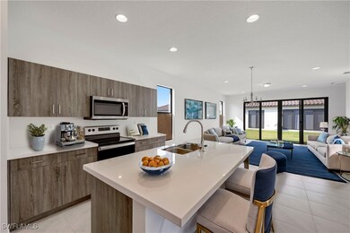 Kitchen with appliances with stainless steel finis