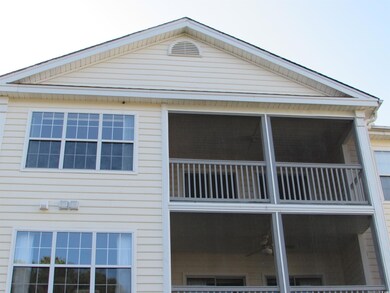 View of screen porch from back of the building.