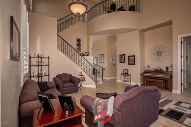 Living Room and dramatic iron staircase