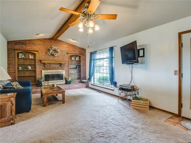 Large living area with a warm fireplace