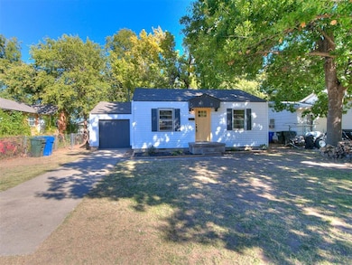 Bungalow-style house featuring driveway, fence, an