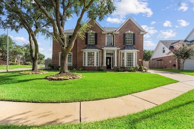 Charming two-story brick home features a classic d