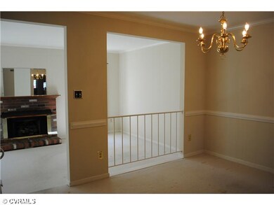 Dining Room - Chair rail, chandelier, opens to kit
