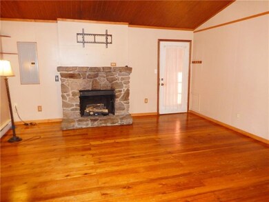 Beautiful hard wood floors flow through the living