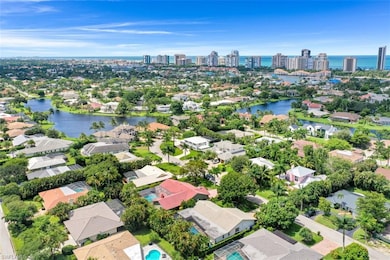 4880 Whispering Pine Way, Naples, FL 34103 - photo 2