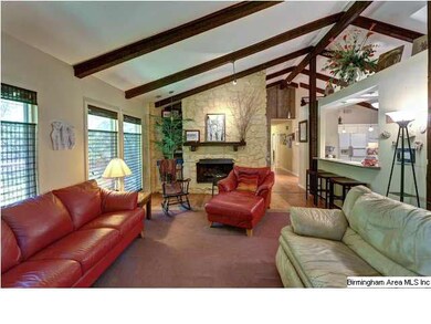 Spacious family/living room is open to kitchen and