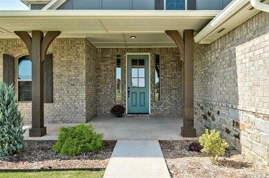 Doorway to property featuring a porch