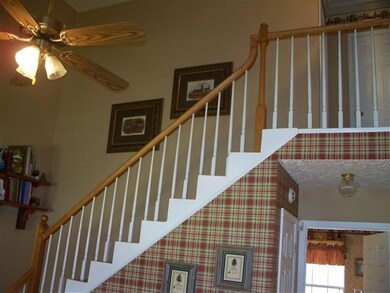 Oak Staircase with balcony overlooking Living Room