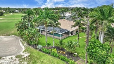 Aerial view of a local golf course and a tree filled landscape