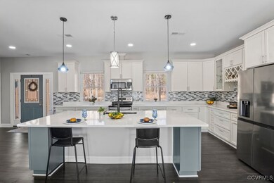 Kitchen featuring a breakfast bar, granite counter