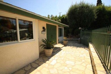 View of enclosed front courtyard with secure entra