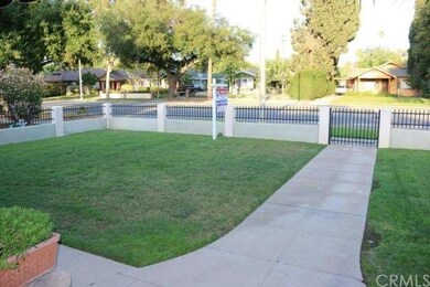 Completely enclosed front yard view from porch.