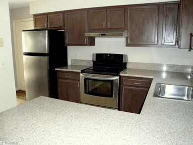 Wow!  How about this Kitchen with new granite counters, freshly painted cabinets and new stainless appliances..Dinner anyone???