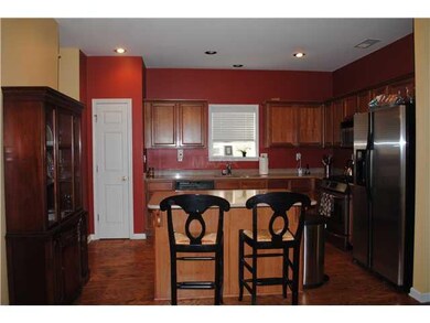 Kitchen with Island looks in the living area and d