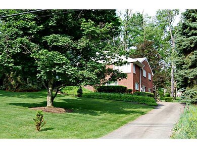 Exterior Front. Mostly level asphalt  driveway
