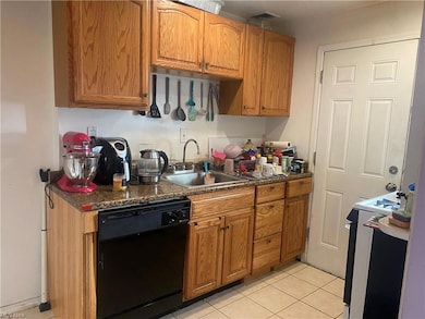Kitchen, with back entrance.