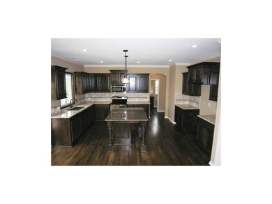 Knotty alder cabinetry and full granite package.