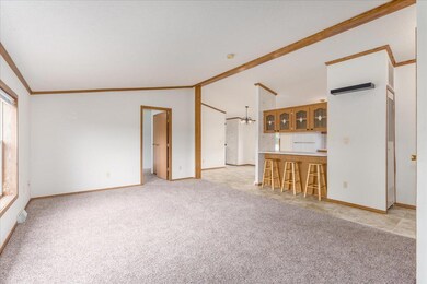 New flooring throughout whole main level. Nice sized living room open to the kitchen and dining