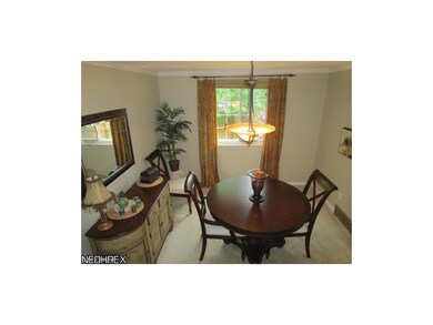 The formal dining space is roomy and bright.