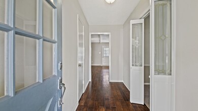 Entry onto gleaming wood floors!