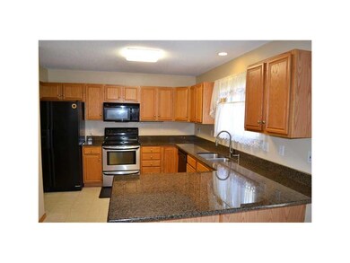 Kitchen. Granite countertops, breakfast bar