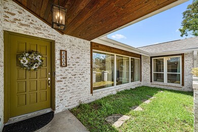 Front door and hallway to bedrooms.