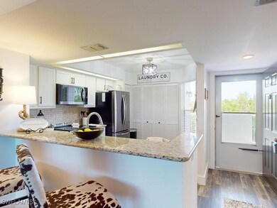 300 Stevens Landing Dr unit 203, Marco Island, FL 34145 - photo 2