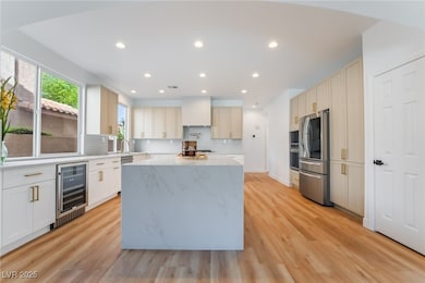 Kitchen featuring appliances with stainless steel