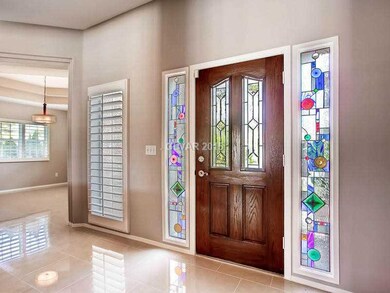 Entry Hall. CUSTOM DESIGNED TIFFANY WINDOW INSERTS