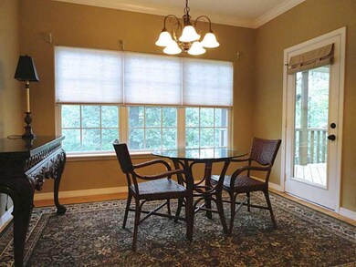Kitchen. Spacious eating area that overlooks the wooded back yard.