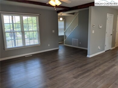 Great room with new paint and flooring!