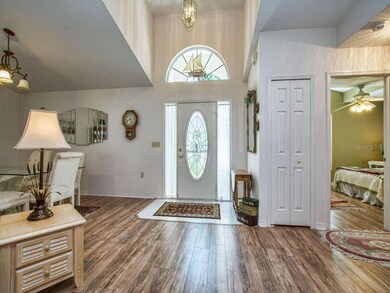 Tiled foyer with entry closet and views of 2nd bed
