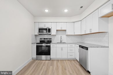 58 Queen Lily Rd, Levittown, PA 19057 - photo 7