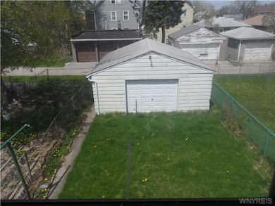 Garage. Good sized fully fenced yard. Double Car G