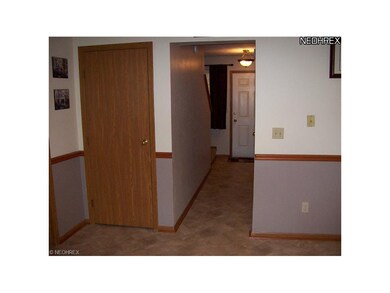 Another view of the Foyer.  1/2 bath located off f