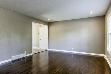 Living Room is open to dining area in Eat-In Kitch