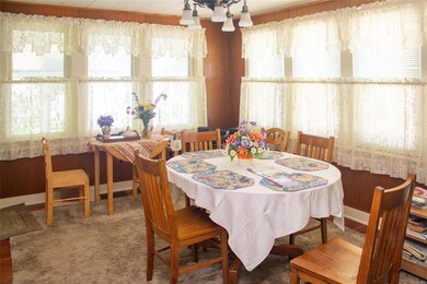 Dining or family room surrounded by windows